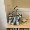 Bolsa de lona grande de capacidad, artística y casual, para mujer, nueva colección primavera 2026, bolso de mano y bolso de hombro de moda a rayas estilo coreano