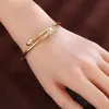 Pulsera de circón de diamantes completos transfronteriza, estilo de lujo ligero, dos tonos dorado y plateado, joyería versátil para mujer, directo del fabricante