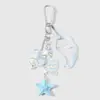 Fresco y Lindo Serie Oceánica Bidimensional Alas de Estrella Azules de Acrílico Estrella de Mar Carrillón de Viento Llavero Colgante para Bolso