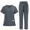 Amazon doctor enfermera salón de belleza uniforme de trabajo bata quirúrgica multibolsillo secado rápido poliéster conjunto de uniforme médico