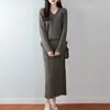 Conjunto de Duas Peças para Mulheres Outono/Inverno 2026 Novo Suéter de Tricô Gola V Lã Pura Manga Longa Cor Sólida Saia Longa Canelada