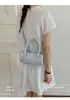 Bolsa de ombro transversal feminina com design único, bolsa de mão simples versátil estilo coreano, nova bolsa de trabalho de bolinhas da moda 2026