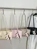 Bolso de axila para mujer estilo vintage para comercio exterior, nuevo modelo de verano 2026, bolso tote de alta calidad, versátil para ir al trabajo, bolso de mano y bolso de hombro