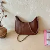 Nova bolsa de ombro trançada estilo coreano 2026, uma bolsa de mão quadrada pequena chique e estilosa para o dia a dia, adequada para mulheres, pode ser usada como bolsa de ombro ou bolsa transversal