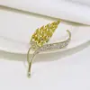 Versión coreana de broche de perla de diamante de alta calidad, moda, hebilla de mariposa anti-luz para bufanda, pasador fino de alta calidad, venta al por mayor de ropa