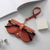 Nova bolsa de PU para óculos de sol estojo de óculos portátil capa protetora para óculos de sol clipe de óculos fofo bolsa de óculos simples feminina