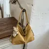 Bolso cruzado transfronterizo de gran capacidad, elegante, para el trabajo y los desplazamientos, diseño de nicho 2026, nuevo bolso de hombro simple, moderno y único