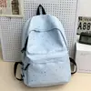 Mochila escolar transfronteriza, diseñada para chicas de secundaria, con un estampado de estrellas fresco y lindo, una mochila versátil adecuada para estudiantes de preparatoria y salidas diarias.