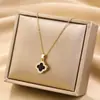 Venta Caliente Transfronteriza Trébol de Cuatro Hojas con Colgante de Concha Blanca Estilo Ins Diseño de Nicho Cadena para Clavícula de Acero de Titanio para Mujer
