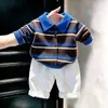 Conjunto de outfit de otoño para niños 2026: Elegante y moderno conjunto de dos piezas para niños: suéter de punto a rayas estilo coreano y pantalones.