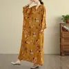 Foto real de Otoño Temprano 2025 Nuevo Estilo Estilo Vacacional Viaje Cuello en V Falda Larga Retro Cubriendo la Carne Vestido Sencillo para Mujeres