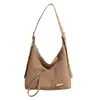 Bolsa de Ombro Retro de Grande Capacidade para o Dia a Dia Feminina Nova Coleção Primavera/Verão 2025 Bolsa Transversal Simples Casual Bolsa de Braço Tote