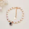 Joyería de perlas al por mayor bolsa de arena movediza de corazón de azúcar ágata colgante de bollo pequeño al vapor gota pequeña deslizante pulsera de perla de agua dulce mujer