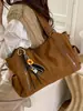 Bolso Tote de Gran Capacidad de Nicho para Mujer 2026 Nuevo Vintage para Viajes Diarios Bajo el Brazo Bolsa para Motociclista con Múltiples Bolsillos Bolso de Hombro Único Cruzado