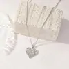 Cadena de Suéter Transfronteriza Especialmente Diseñada para Estilo Europeo y Americano Más Vendido en Amazon Estilo Hueco de Corazón de Melocotón Moda para Mujer Acero de Titanio Collar Largo