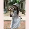 Falda tipo tulipán de lunares blancos estilo coreano con cintura elástica, versátil y estiliza, adecuada para figuras petite, falda de longitud media