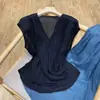 2026 Verano Color Sólido Moda Artículo Caliente Nicho Top sin Mangas para Dama Viaje Simple sin Mangas Ajustado Manga Corta Estilo Old Money