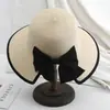 Sombrero de paja para niños, protector solar de verano, plegable, de ala grande, con lazo y borde abierto, estilo coreano.