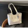 Bolsa Elegante Transfronteiriça para o Dia a Dia Feminina Grande Capacidade 2025 Nova Primavera Versátil Ombro Bolsa de Compras Bolsa Tote Casual
