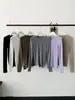 Camiseta básica de punto de seda de morera y cachemira en stock para otoño e invierno, corte ajustado, cuello redondo, agradable para la piel, de manga larga, suéter interior de lana de lujo ligero