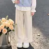 Chaleco dopamina otoñal simple y versátil, camisa con cuello de muñeca, atuendo en capas, pantalones de pierna ancha casuales y elegantes - un conjunto de tres piezas para niñas