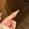 Anillo minimalista hueco estilo coreano con incrustaciones de circonita, diseño de nicho de lujo ligero para mujer, anillo versátil, joyería transfronteriza