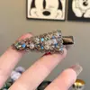 Pinza para el cabello de cristal con diamantes completos ultra brillante estilo coreano con un diseño de moda, pinza lateral triangular para arreglar el fleco delantero, pinza de pico de pato sin costuras