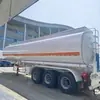 Semirreboque Tanque de Aço Carbono de 4 Eixos de Baixo Custo Transfronteiriço para Óleo Comestível, Reboque Tanque de Óleo de 50/60 Metros Cúbicos, Veículo de Transporte de Leite