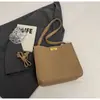 Bolsa de balde com padrão de lichia para moda transfronteiriça, nova bolsa casual estilosa para mulheres, grande capacidade, bolsa de ombro único transversal retrô