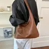 Bolso tejido de nicho de alta gama 2026 nuevo modelo de gran capacidad para madre e hija, estilo casual perezoso, bolso de hombro único para el día a día