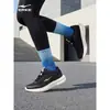 Zapatillas de correr para mujer Hongxing Erke 2026 nuevo modelo de verano, zapatillas deportivas transpirables de malla, zapatos negros para mujer con suela ligera y suave