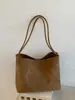 Bolso tote tejido retro, nuevo estilo 2026, gran capacidad, versátil para el trabajo, bolso de hombro tipo cubo, simple y casual