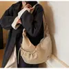 Bolsa de Nylon Gran Capacidad 2025 Nuevo Otoño e Invierno Diseño de Nicho Bolso Cruzado Plisado Brillante para Viajes Cotidianos Bolso Dumpling
