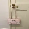 Bolsa de Mão Feminina Texturizada de Grande Capacidade 2026 Nova Cor Sólida Moda Casual Laço Bolsa Baguete de Ombro de Verão
