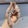Llavero colgante de cadena de lazo de cuentas de color brillante de dibujos animados de moda, llavero para bolso de mejores amigas, pequeño regalo