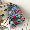 Mochila Masculina Ins Tendência Legal Estudantes Universitários Ensino Médio Mochila Fashion Grafite Personalizado Mochila Estilo Harajuku Grande Capacidade