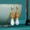 Pendientes chapados en oro de estilo nacional de alta calidad con pequeñas flores de colores, nuevos pendientes de estilo chino retro Cheongsam, estilo antiguo, moda nacional clásica.