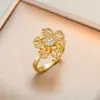Colar feminino estilo japonês e coreano cross-border floco de neve mesmo estilo micro-incrustado flor zircão conjunto rotativo terno titânio aço colar atacado