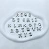 Europa y Estados Unidos moda DIY transfronteriza burbuja gorda 26 letras inglesas acero inoxidable chapado en oro de 18 quilates collar con colgante de acero de titanio
