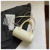 Bolso Cilíndrico Exquisito y de Moda 2026 Nuevo Verano Versátil para Mujer Bolso Cruzado Bolso Tote Pequeño Bolso Almohada