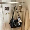 Mochila Casual de Grande Capacidade para Mulheres Nova Moda Primavera e Verão 2026 Bolsa de Ombro Simples Versátil para o Dia a Dia Bolsa Transversal