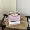 Bolso Retro de Color Sólido de Nicho Único para Mujer 2026 Nuevo Bolso Cruzado Versátil Bolso de Mano Mini Exquisito Bolso Tote Pequeño