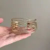 Roupas vintage de segunda mão Pulseira com fio de ouro Faixa de cabelo trançada dourada Versátil para emagrecer