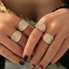 Moda europea y americana retro adornos de mano micro incrustados con diamante completo cóncavo acero de titanio chapado en oro real de 18k lujo ligero anillo de dedo para comida al por mayor