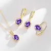 Transmisión en vivo venta caliente conjunto de huevo de paloma anillo de base de cobre chapado en oro de 18 quilates pendientes collar colgante joyería para mujer venta al por mayor