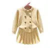 Conjunto de punto nuevo para otoño 2026 estilo coreano para niñas, cárdigan suéter elegante y falda plisada para bebé niña