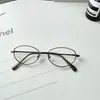 2025 Estilo Coreano Metal Marco Pequeño Ovalado Anti-Luz Azul Espejo Plano Celebridad de Internet Hombres y Mujeres Retro Literario y Elegante Montura de Gafas
