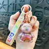 Llavero de dibujos animados creativos kappi bala de cara giratoria lindo colgante para mochila escolar llavero para llaves de coche pequeño regalo al por mayor