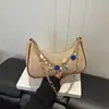 Bolso de Mano para Mujer 2026 Primavera Nuevo de Moda con Cadena de Perlas y Conchas, Tejido Versátil y Texturizado, Bolso de Hombro