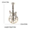 Novo estilo All-match criativo liga strass guitarra broche requintado all-match feminino terno cardigan corsage jóias pino